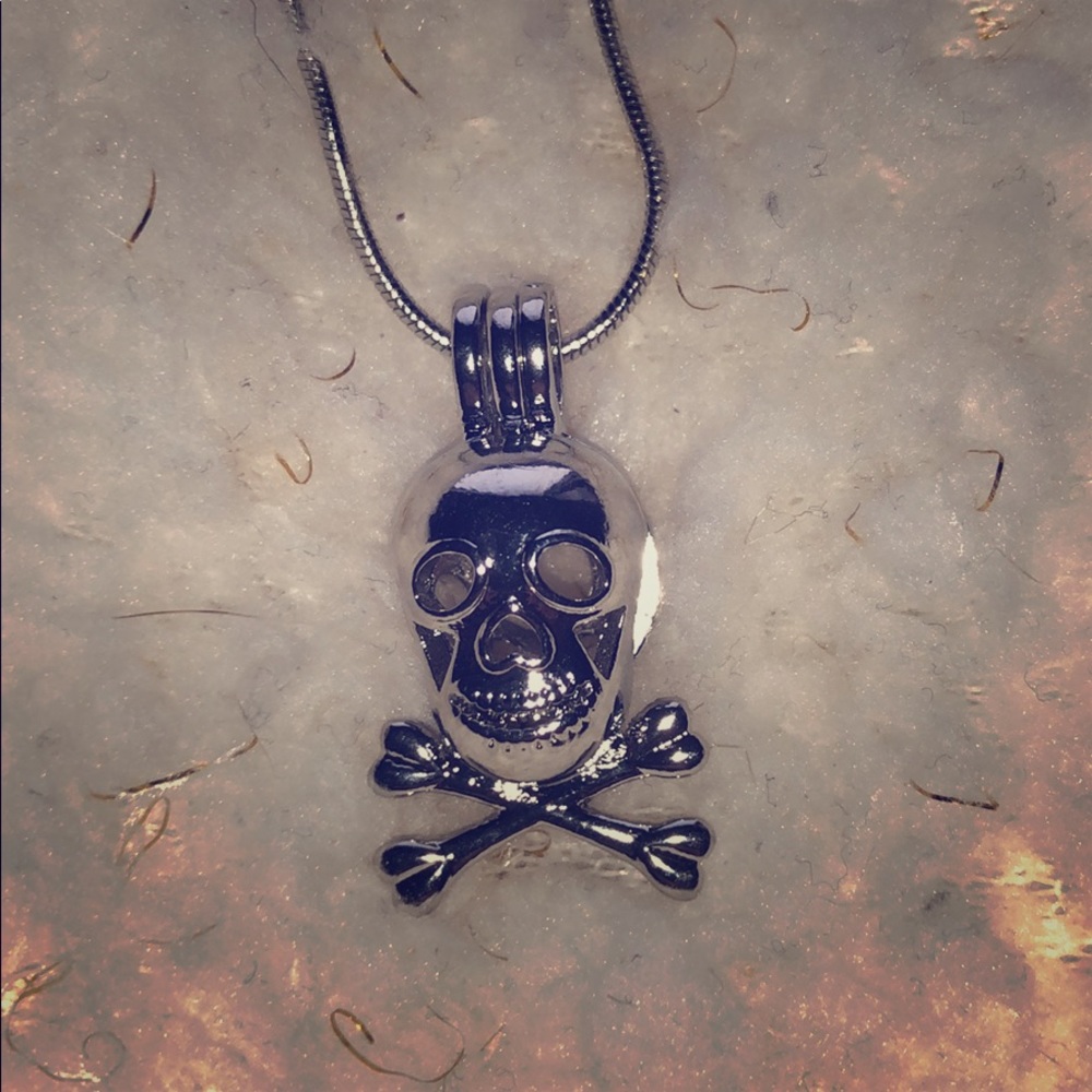 Skull cage necklace